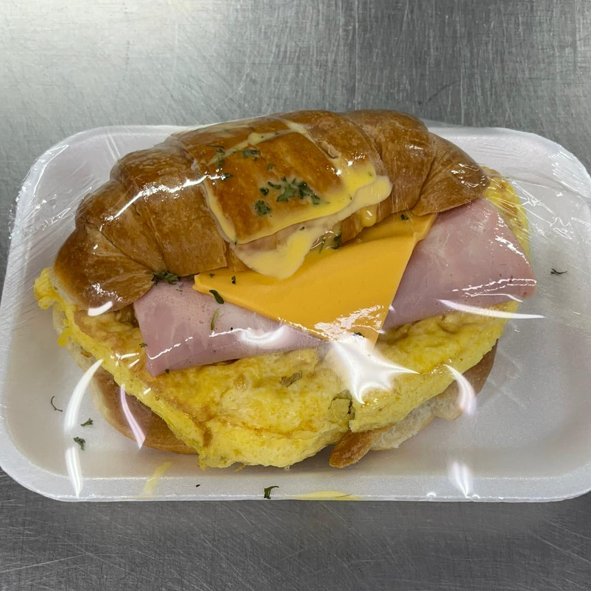M) Croissant with omelette, ham, and cheese 1X