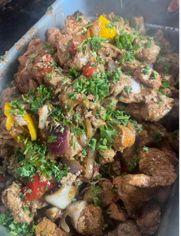 I) Masitas de Puerco en Salsa