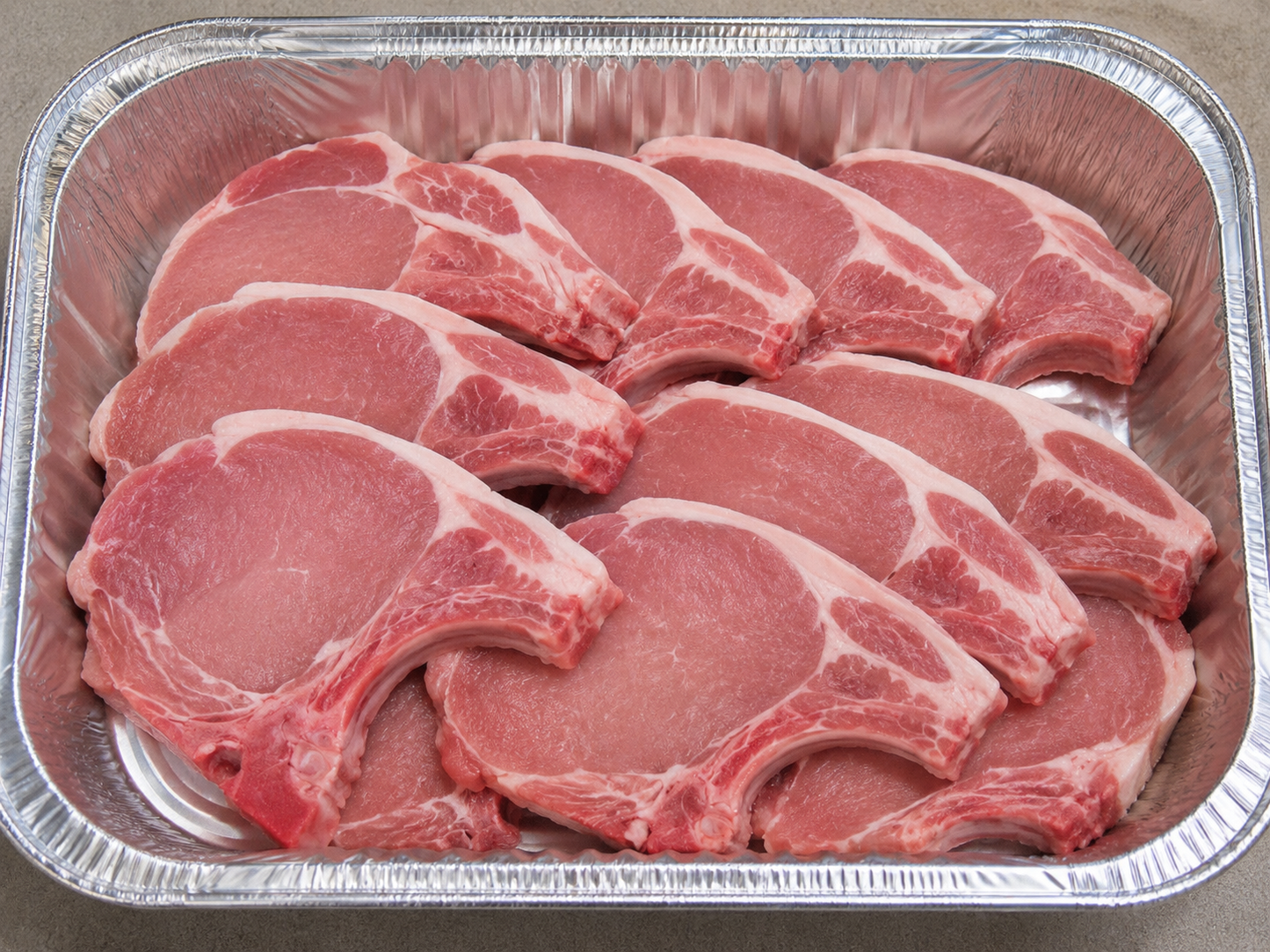 I) Chuleta de puerco cruda con hueso/ Raw Pork chops